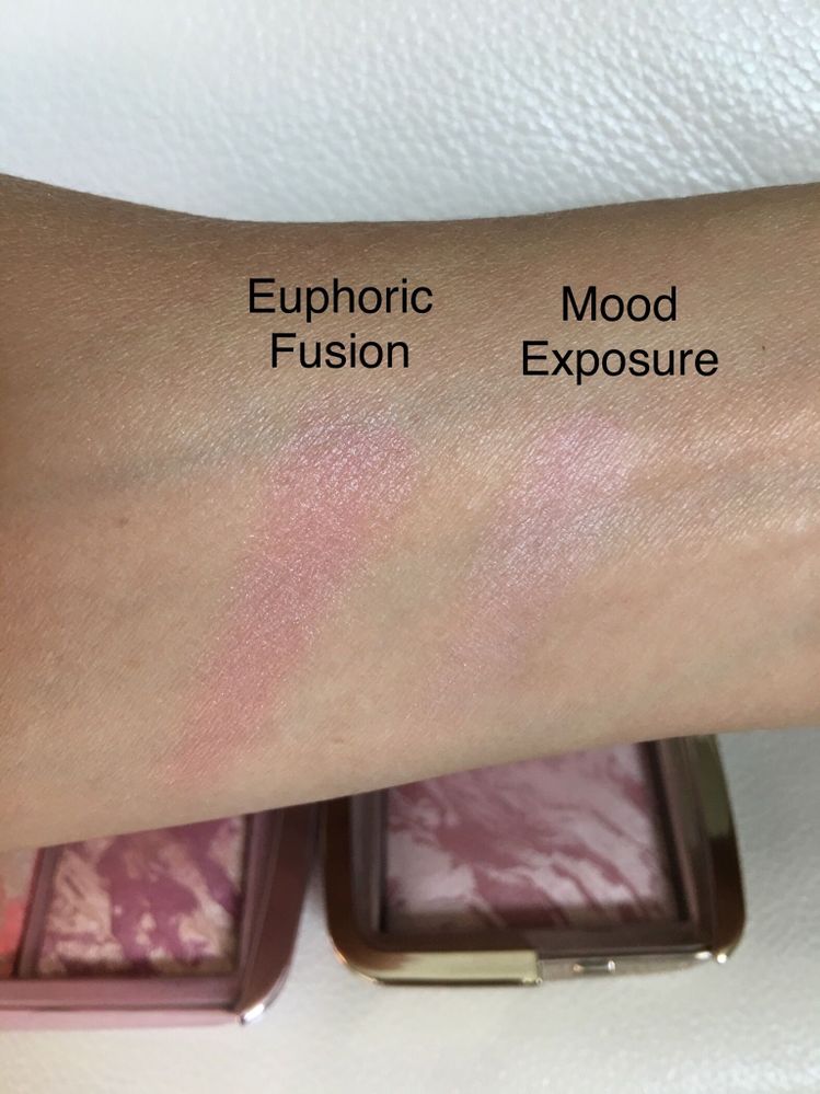 Euphoric is much more shimmery and darker than Mood Exposure. It also seems to go on smoother.